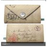 Billetera sobre flores love letters